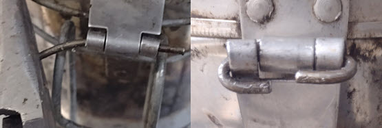 Wire inserted into smoker hinge and bent securely.